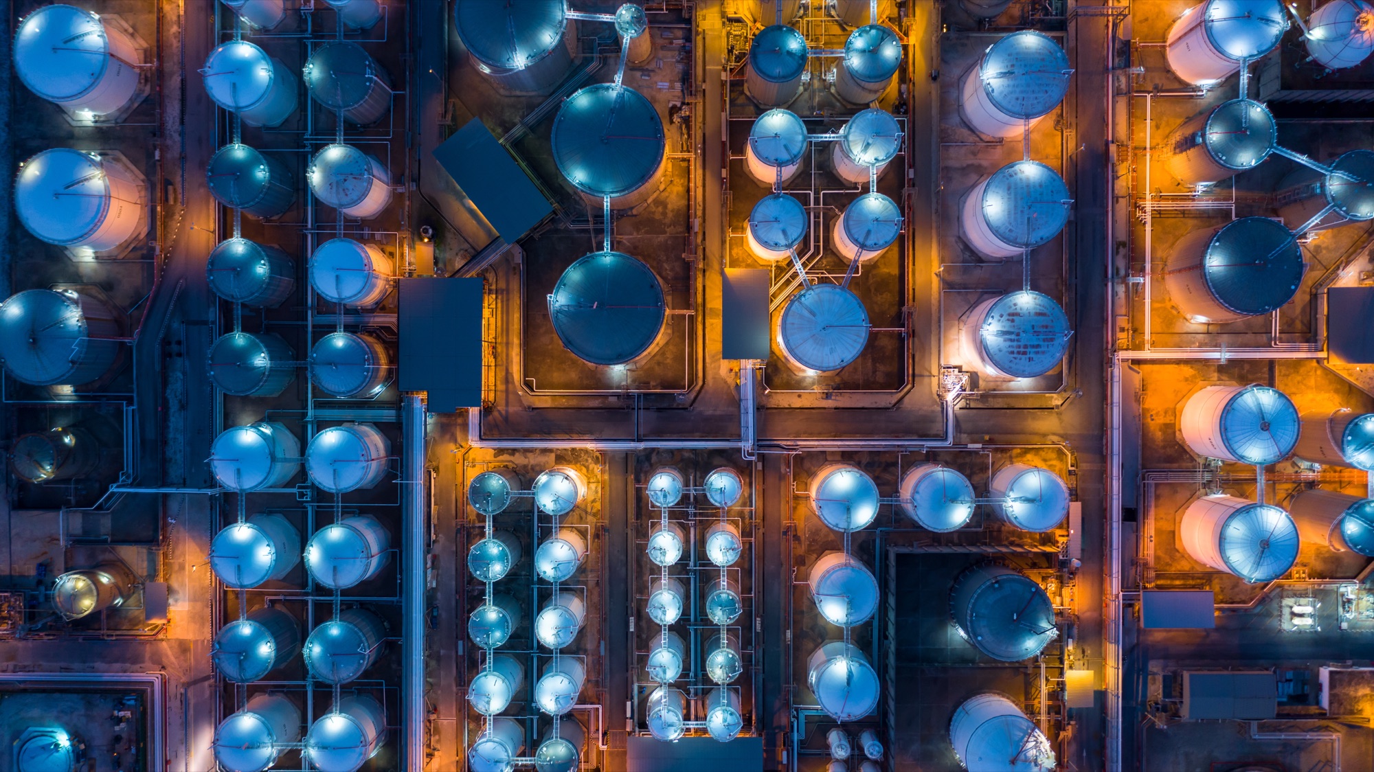 Storage tank farm at an oil terminal at night